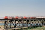 Santa Fe C44-9W #655 (with C40-8W #807, B40-8W #547 & GP60M #125) leads a westbound over the Colorado River 